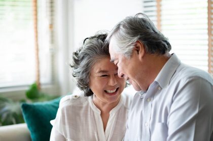 happy older couple looking at each other