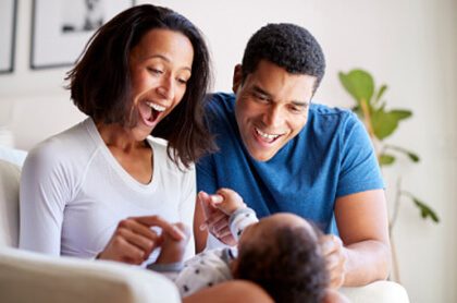 happy couple with baby